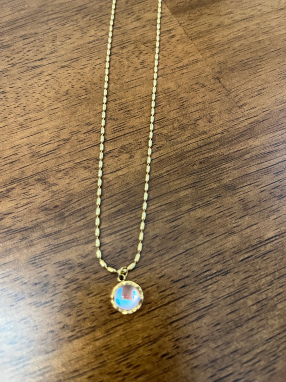 Gold Beaded Necklace with Pink Opalescent Pendant